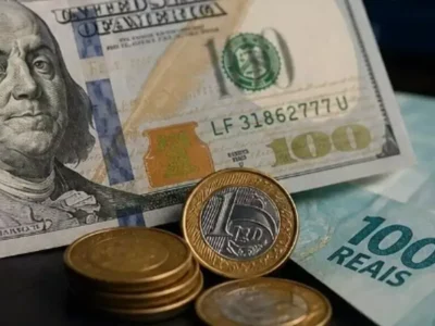 Dólar cai a R$ 5,10 após Copom cortar juros a 14%